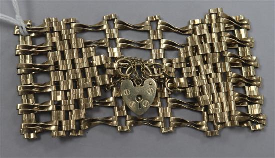 A 9ct gold broad fancy link bracelet.